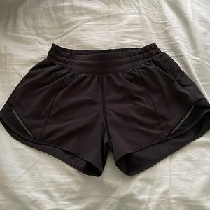 Lululemon black hotty hot shorts size 6. 4” length